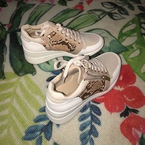 Also snake skin boots with zipper